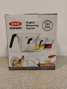 lot 82 image: NEW OXO ANGLED MEASURING CUP SET
