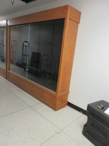 lot 942 image: LARGE OAK DISPLAY CABINET