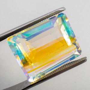 lot 54 image: DICHROIC GLASS - 16.93ct. Rectangular step cut BIG