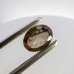 lot 59 image: ANDALUSITE - 1.22ct. Oval brilliant cut