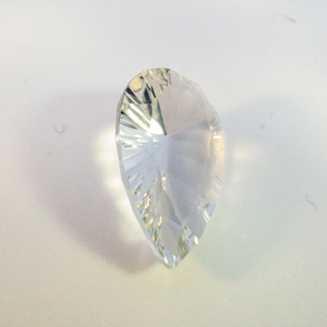lot 60 image: GREEN QUARTZ (PRASIOLITE) - 3.60ct. Concave faceted pear shape brilliant cut