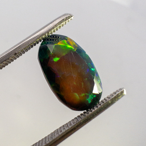 lot 79 image: SMOKED ETHIOPIAN OPAL - 2.72ct. Oval brilliant cut