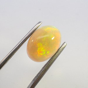 lot 80 image: ETHIOPIAN OPAL - 3.39ct. Oval cabochon cut