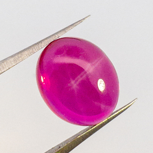 lot 93 image: LAB GROWN STAR RUBY - 7.51ct. Oval cabochon cut