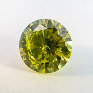 lot 99 image: YELLOW MOISSANITE - 10mm Round brilliant cut