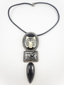 lot 146 image: Amy Kahn Russell Black Onyx Tiger Sterling Silver PinPendant Enhancer With Rope Necklace.