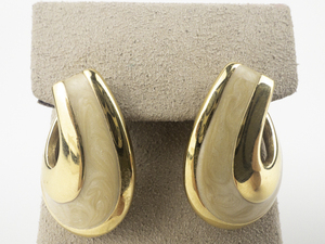 lot 173 image: Napier Beige Enamel Swoop Gold Tone Base Metal Post Back Pierced Earrings.