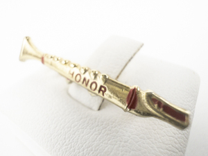 lot 179 image: Musical Instrument (Clarinet) Honor Yellow Base Metal Bar Brooch. Red Enamel Highlights