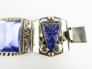 lot 274 image: Taxco, Mexico Blue Glass Hand Carved Mayan Mask Base Metal Panel Bracelet.