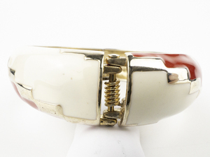 lot 279 image: Red & White Enamel Yellow Base Metal Hinged Bangle.