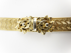 lot 289 image: Acathanthus Leaf Trimmed Yellow Base Metal Bracelet.