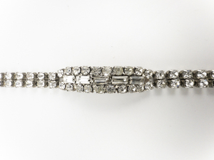 lot 290 image: Rhinestone White Plated Base Metal Tennis Bracelet.