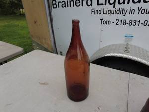 lot 7 image: Vintage Amber Bottle Collection - Set of 3