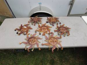 lot 35 image: Lot of 7 Decorative Sun Face Wall Hangings with Bells
