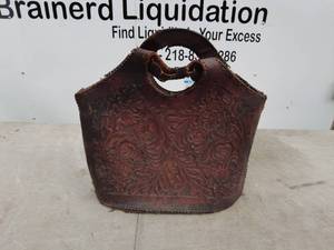 lot 77 image: Handcrafted Leather Basket with Intricate Floral Design