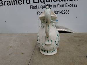 lot 114 image: Vintage Embossed Ceramic Pitcher with Cherub Design
