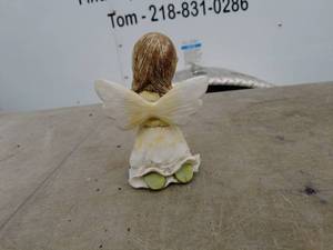 lot 176 image: Kneeling Angel Figurine with Ladybug