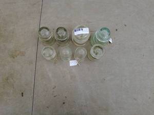 lot 323 image: Lot of 9 Vintage Glass Insulators with Reference Book