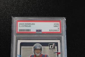 lot 18 image: 2023 Donruss CJ Stroud #339 PSA 9 Rookie Card