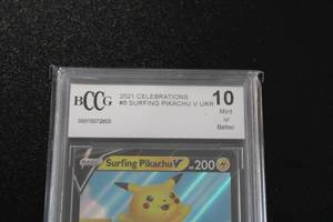 lot 53 image: Pokemon Surfing Pikachu V #008025 BCCG 10