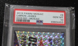 lot 142 image: 2019-20 Mosaic Give and Go Silver Mosaic Prizm LeBron James #8 PSA 10