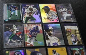 lot 169 image: Randy Moss Football Card Lot  16 Cards w (6) Rookies (1) Relic (3) Serial Numbered