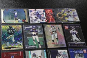 lot 170 image: Randy Moss Football Card Lot  13 Cards w (3) Rookies (1) Relic (6) Serial Numbered