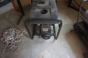 lot 66 image: Coleman Power Mate 6250 Watt Gas Powered Generator