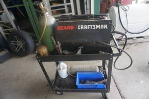 lot 91 image: Craftsman Wire Feed Mig Welder With Tank, Tips, Wire on Wheeled Cart