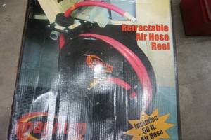 lot 103 image: Magna Air Retractable Wall Mount Air Hose Reel With 50 of Air Hose