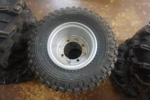 lot 196 image: 4 - Duro Youth ATV Tires and 4 Bolt Rims