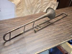 lot 66 image: Vintage Lyon & Healy Century Trombone with Amazing Patina over Beautiful Scrollwork
