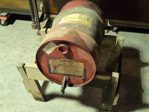lot 72 image: Archer 2 Cycle Oil Barrell on Wood Stand