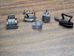 lot 175 image: Small Decorative or Doll House Metal Cash Register, Sad Irons, Coffee Grinder, Sewing Machine