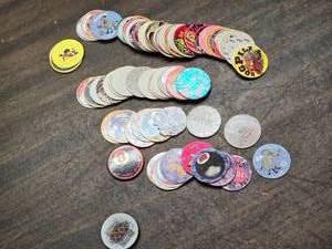 lot 178 image: Pog  Bottle Caps Approximately 80 of them