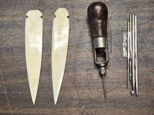 lot 181 image: Vintage Leatherworking Tools with Bone Fids and Stitching Awl