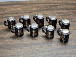 lot 194 image: Lot of 9 Mini Rumple Minz Lidded Mug Style Shot Glasses