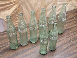 lot 212 image: Lot of 8 Vintage Coca-Cola Bottles