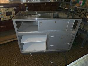 lot 231 image: 48 Wide Glass Retail Display with Light Fixture Inside