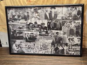 lot 252 image: The Three Stooges Framed Poster