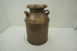 lot 175 image: Metal milk can, 21 tall
