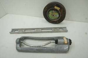 lot 180 image: Hand truck wheel, sprinkler and level