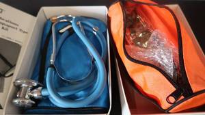 2 NEW IN BOXES BLOOD PRESSURE CUFFS WITH SCOPES.