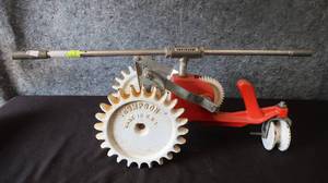 TRAVELING TRACTOR WALKING CAST IRON LAWN SPINKLER