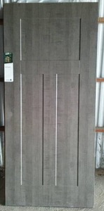 lot 780 image: Trugrain Wood Grain Ext. Steel Slab Door.