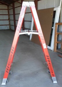 lot 842 image: Werner 4 ft. Fiberglass Rolling Ladder.
