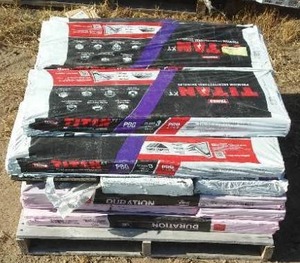 lot 980 image: Tamko (8 Bundles)  and Owens Corning (9 Bundles) Shingles .