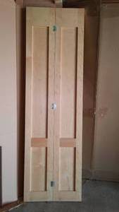 lot 993 image: BPI Bi-Fold Clear pine Door.