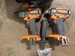 RIDGID 18V Brushless Cordless 2-Tool Combo Kit with Hammer Drill, Impact Driver No Batteries and No Charger  Customer Returns See Pictures