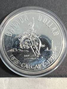 1975 CALGARY SILVER DOLLAR IN AIRTITE
